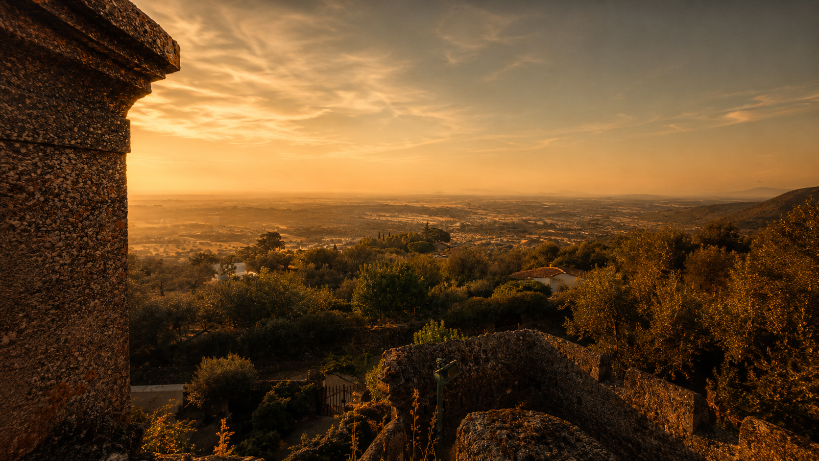 View of the Alentejo plain from a stone embrasure in the castle walls of Castelo de Vide